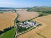 Farm in the middle of harvested fields